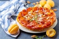 Apricot tarte tatin pie with thyme and almonds Royalty Free Stock Photo