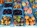 Apricots, cherries and plums at the market Royalty Free Stock Photo