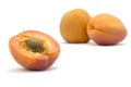 Apricots, half and whole isolated on a white background