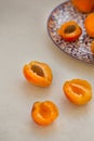 Apricots on light gray tabletop Royalty Free Stock Photo