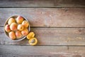 Apricots on a wooden background