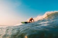 April 12, 2019. Bali, Indonesia. Stand Up Paddle surfer ride on ocean wave. Stand Up Paddle surfing at waves in Bali
