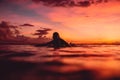 April 16, 2020. Bali, Indonesia. Surf girl relax on surfboard. Surfers in ocean during surfing at sunrise