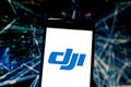 April 15, 2019, Brazil. DJI logo on the mobile device. DJI is a Chinese technology company, known for manufacturing drones