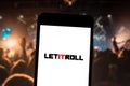 Let It Roll logo on mobile device. Let It Roll is a music festival that takes place in Milovice, Czech