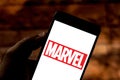 April 3, 2019, Brazil. Marvel logo on the screen of the mobile device. Marvel Comics is a publisher of American comics and media. Royalty Free Stock Photo