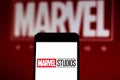 Marvel Studios logo on mobile device. Marvel Studios is an American film studio part of the conglomerate