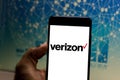 Verizon Wireless logo on the mobile device. Verizon is the largest mobile phone operator in the United