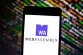 April 11, 2019, Brazil. WebAssembly logo on your mobile device. WebAssembly is a web programming language