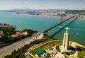 April of 25 bridge in Lisbon, crossing the Tagus River and Statue of Jesus