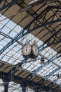 April 2015 - Brighton, England: trainstation at Brighton looking up the roof and clock