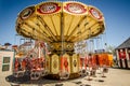 BROOKLYN NEW YORK: Lynn`s Trapeze, a swinging chairs carnival ride awaits riders on a spring day at Luna Park, on