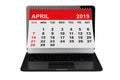 April 2019 calendar over laptop screen. 3d rendering Royalty Free Stock Photo