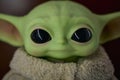 April, 2021: The Child, Grogu or baby Yoda, fictional character from the TV series The Mandalorian Royalty Free Stock Photo