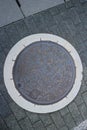 Circle steel manhole cover or metal sewer in Nogoya city, April 6 2019, Japan