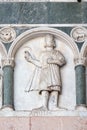 April, detail of the bass-relief representing the Labor of the months of the year, Cathedral in Lucca, Italy