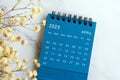 April 2023 flat lay blue calendar