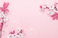 April floral nature. Spring blossom and may flowers on pink. For banner, branches of blossoming cherry against background. Dreamy Royalty Free Stock Photo