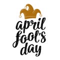 April fool`s day calligraphic handwriting lettering with jester cap engraving