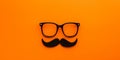 April Fools Day Disguise A Clever Composition Of Glasses, Fake Nose, And Mustache On Vibrant Orange Background Royalty Free Stock Photo