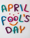 April Fools Day phrase made of plasticine colorful letters on background Royalty Free Stock Photo