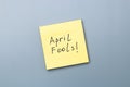 April fools day reminder on yellow sticky note. be aware and do not let be fooled