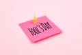 April Fools ' Day text celebration background with paper sticky note and office pin on pink background. All Fools ' Day, humor, Royalty Free Stock Photo
