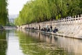 April 2015 - Jinan, China - local people fishing in the City moat of Jinan, China