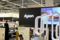 April 2023 Milan, Italy: Dyson logo icon and Dyson products closeup in the electronic store