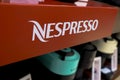 April 2023 Milan, Italy: Nespresso logo icon closeup in th electronic store. Nespresso coffee machine closeup