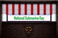 April month special day. National Submarine Day, Neon Text Effect on Bricks Background