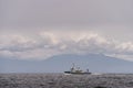 April 13, 2023 - Nanaimo, Canada - Canadian military vessel Stikine sails northward in the Strait of Georgia.