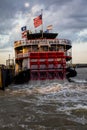 APRIL 24, 2019, NEW ORLEANS, LA, USA - Natchez Riverboat on Mississippi River in New Orleans, Louisiana at sunset