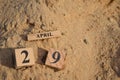 April 29, Number cube with Sand background.