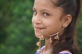 A simple village girl looks pretty and cute while smiling