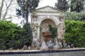 Pubol Dali Castle Dozen of Wagner head statues by the pool.