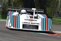 21 April 2018: Riccardo Patrese drive Lancia Martini LC1 prototype during Motor Legend Festival 2018 at Imola Circuit Royalty Free Stock Photo