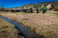 APRIL 22, 2017, RIDGWAY COLORADO: Rancher on Centennial Ranch, feeds cattle with tractor- a cattle ranch owned by Vince Kotny Royalty Free Stock Photo