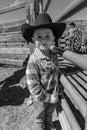 APRIL 22, 2017, RIDGWAY COLORADO: Young cowboy during cattle branding on Centennial Ranch, Ridgway, Colorado - a ranch with Angus/