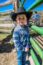 APRIL 22, 2017, RIDGWAY COLORADO: Young cowboy during cattle branding on Centennial Ranch, Ridgway, Colorado - a ranch with Angus/