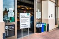 April 9, 2020 Santa Clara / CA / USA - Sign posted in at the entrance to a Whole Foods Market store, requesting customers to