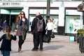 People shopping on Patrick Street in Cork, the city`s main street for stores, street performers, restaurants, and busy city life.