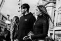 People shopping on Patrick Street in Cork, the main street for stores, street performers, restaurants; photographed in monochrome. Royalty Free Stock Photo