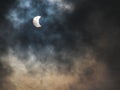 solar eclipse during the day with cloudy sky Royalty Free Stock Photo