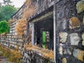 April 13th 2022. Uttarakhand India. Empty remains of a stone construction with vegetation growing all over