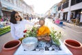 14 April 2019-Thailand::shower the monk sculpture in Songkran festival