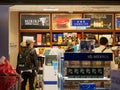 Tourists buy alcohol and tobacco, Kansai Airport, Japan