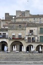 April 2, 2021 in Trujillo, Spain. Stone houses in the main square of Trujillo where the statue of Francisco Pizarro is