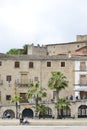 April 2, 2021 in Trujillo, Spain. Stone houses in the main square of Trujillo where the statue of Francisco Pizarro is