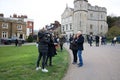 10 April 2021 - Windsor UK: Media interviewing public outside Windsor Castle